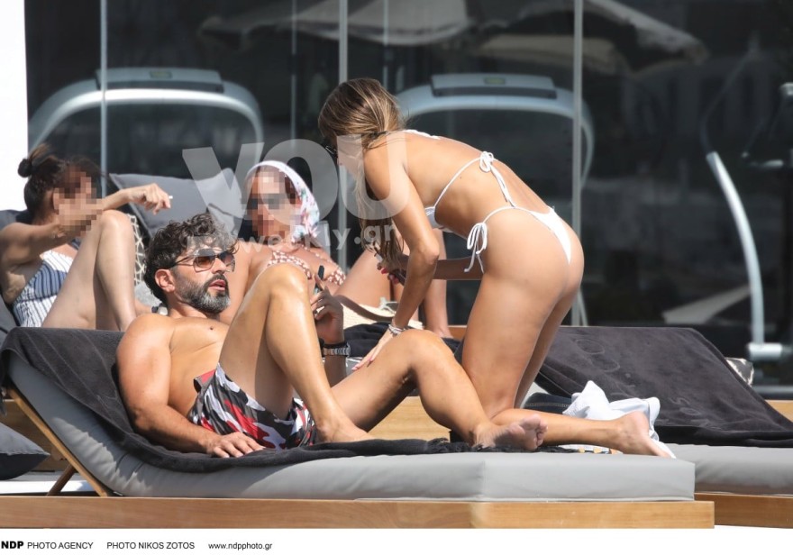 Η Βρισηίδα αλείφει με αντηλιακό τον Μαρτίκα στη Μύκονο στο ταξίδι τους