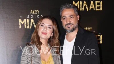 Με καστόρινες μπότες και σακάκι στο πλευρό του Σουλτάτου - Η εμφάνιση της Λασκαράκη στην πρεμιέρα που ήταν ο Τσιμιτσέλης μαζί με τη Γερονικολού