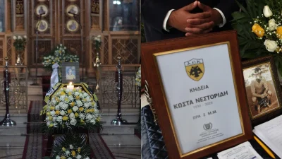 Τυλιγμένο με τη σημαία της ΑΕΚ το φέρετρό του με κίτρινα λουλούδια στο πλάι - Βαρύ το κλίμα στην κηδεία του Κώστα Νεστορίδη