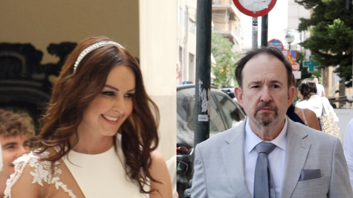 Γάμος Γιάννη Παπαμιχαήλ και Ελένης Κολτζή: Το νυφικό με το άνοιγμα στα πόδια και τη δαντελένια λεπτομέρεια στον ώμο - Η αγκαλιά στο δημαρχείο λίγο πριν υπογράψουν