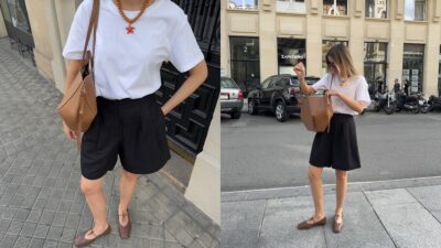 μια κοπέλα ποζάρει φορώντας βερμούδα